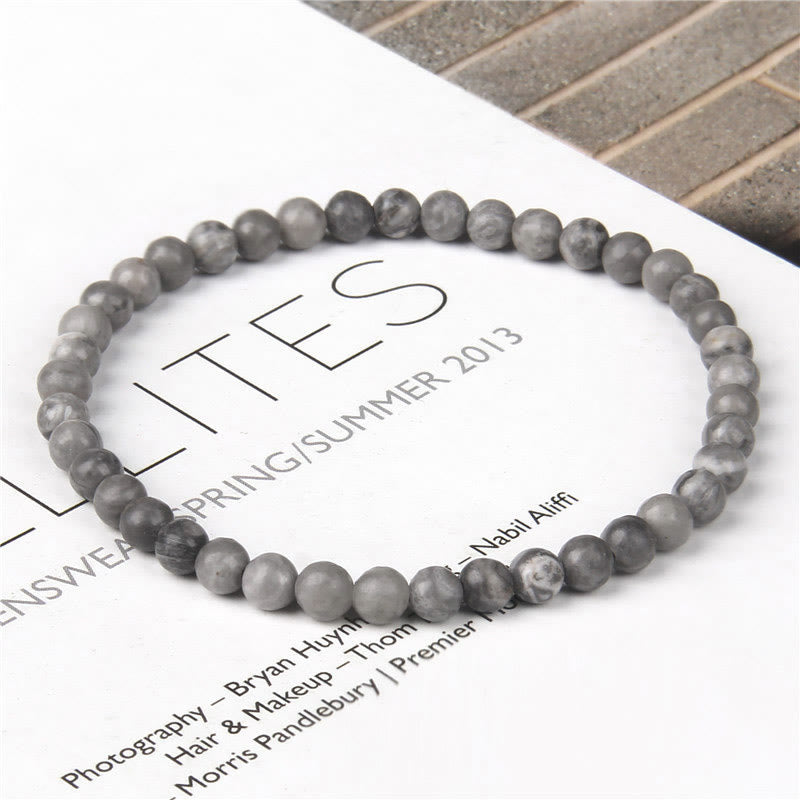 Braccialetto di guarigione con perline di cristallo di varie pietre Buddha Stones da 4 mm