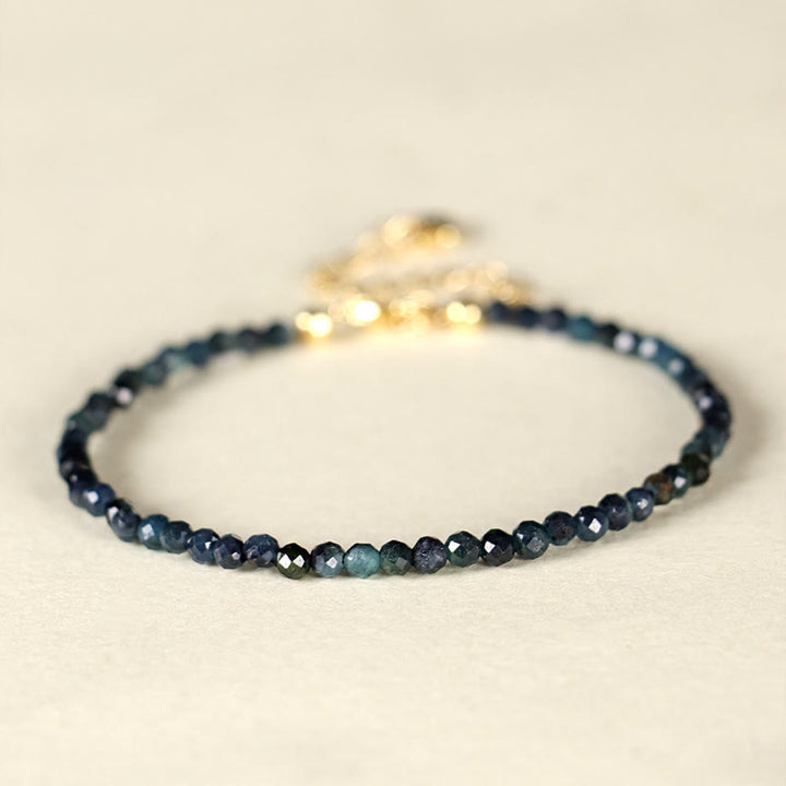 Braccialetto della saggezza con perle di rame, tormalina e indicolite Buddha Stones