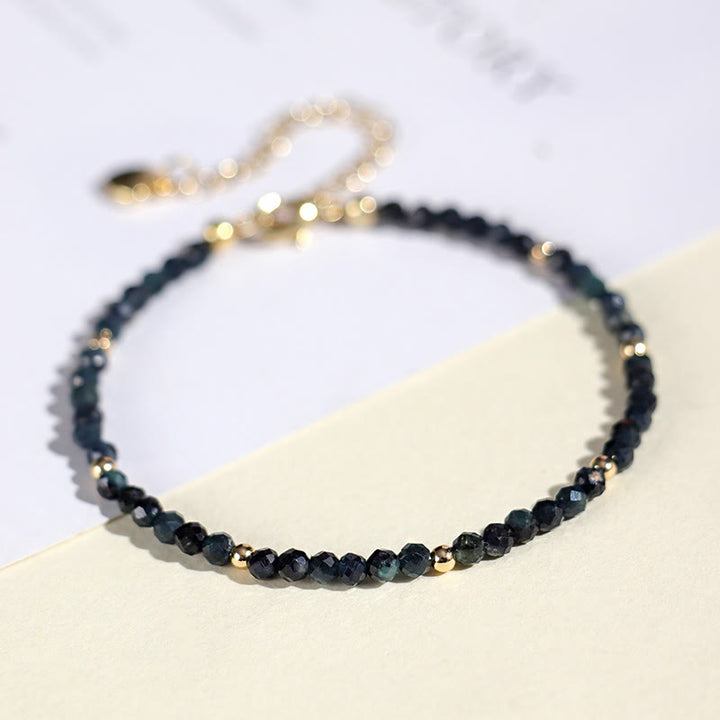 Braccialetto della saggezza con perle di rame, tormalina e indicolite Buddha Stones