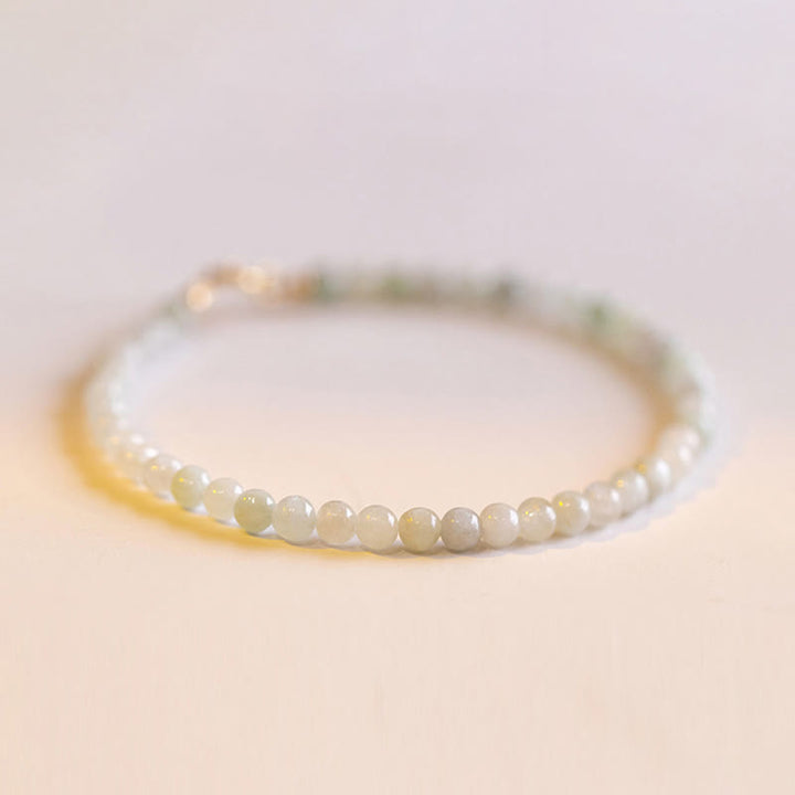 Braccialetto portafortuna in rame placcato oro 14k con perline ultrasottili in giada da 2 mm Buddha Stones