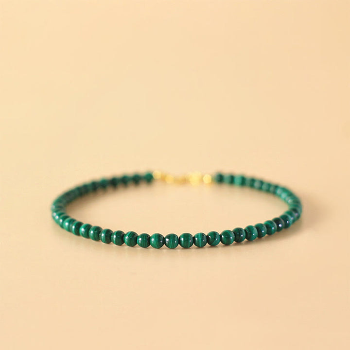 Bracciale anti-ansia in rame placcato oro 14k con perline di malachite naturale da 4 mm Buddha Stones