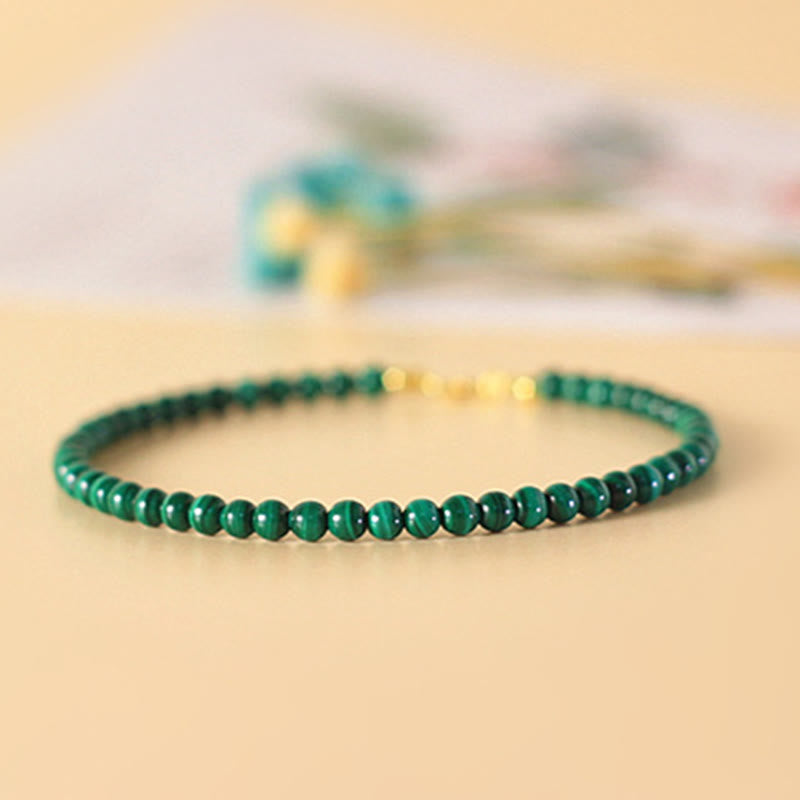Bracciale anti-ansia in rame placcato oro 14k con perline di malachite naturale da 4 mm Buddha Stones
