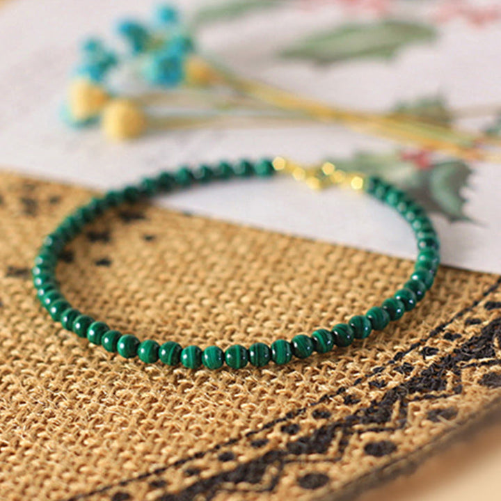 Bracciale anti-ansia in rame placcato oro 14k con perline di malachite naturale da 4 mm Buddha Stones