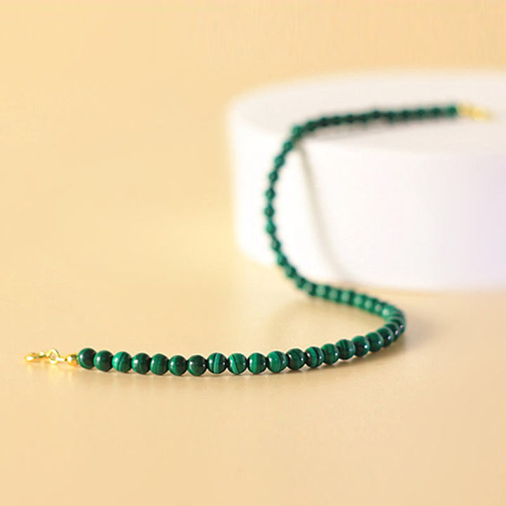 Bracciale anti-ansia in rame placcato oro 14k con perline di malachite naturale da 4 mm Buddha Stones
