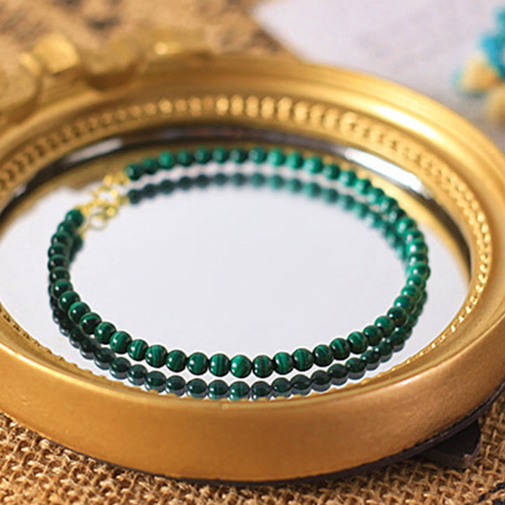 Bracciale anti-ansia in rame placcato oro 14k con perline di malachite naturale da 4 mm Buddha Stones