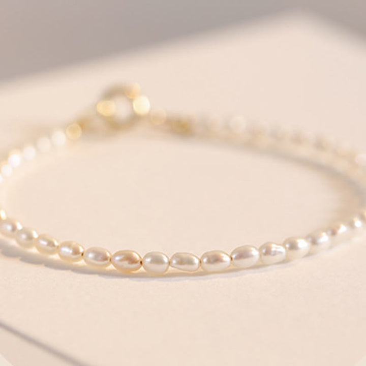 Braccialetto della saggezza in rame placcato oro 14k con perle naturali da 2 mm e perle ultrasottili Buddha Stones