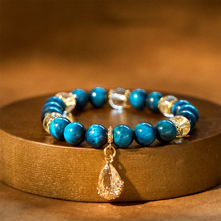 Bracciale Buddha Stones Occhio di Tigre Blu Cristallo Bianco Goccia d'Acqua Forza