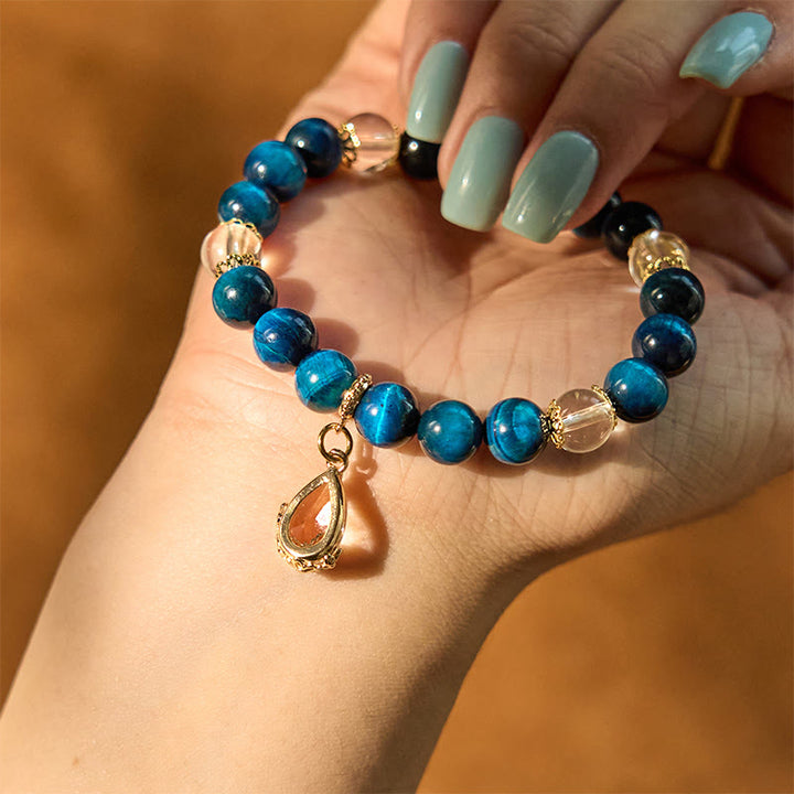 Bracciale Buddha Stones Occhio di Tigre Blu Cristallo Bianco Goccia d'Acqua Forza