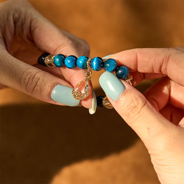 Bracciale Buddha Stones Occhio di Tigre Blu Cristallo Bianco Goccia d'Acqua Forza