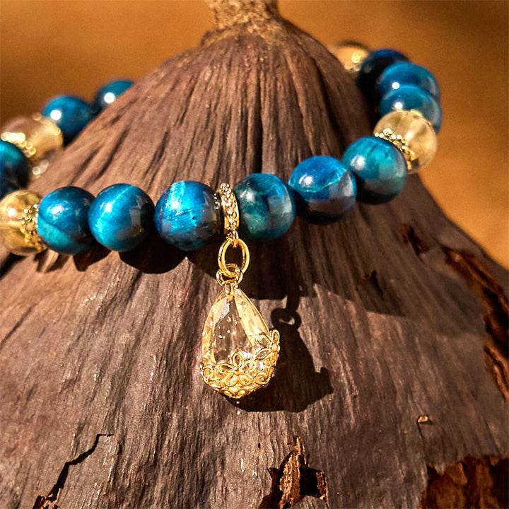 Bracciale Buddha Stones Occhio di Tigre Blu Cristallo Bianco Goccia d'Acqua Forza