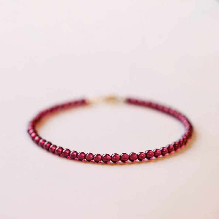Braccialetto di protezione con perline ultrasottili di granato naturale piccolo da 3 mm Buddha Stones