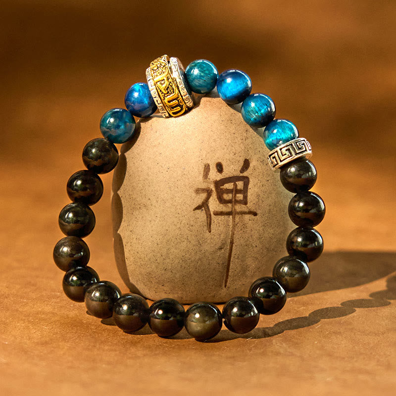 Braccialetto di protezione in occhio di tigre blu ossidiana e argento lucido Buddha Stones