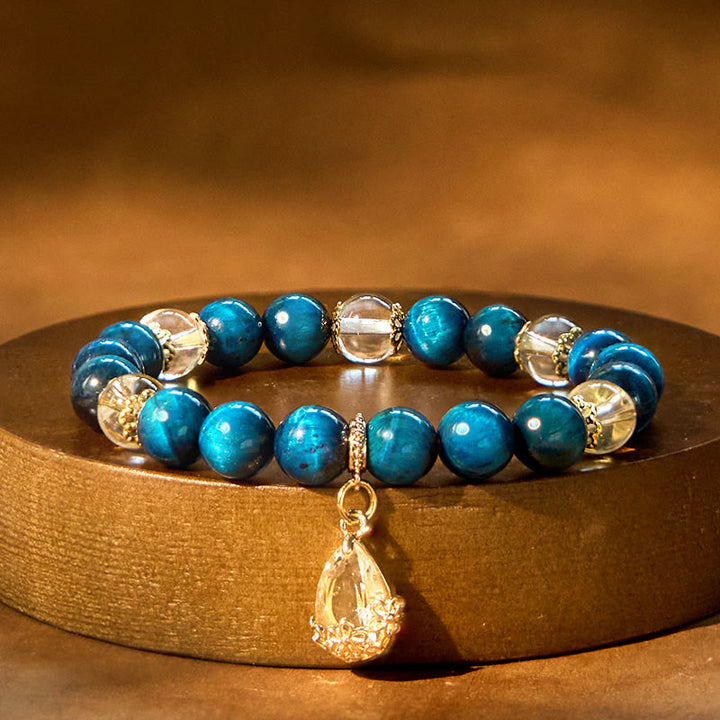 Bracciale Buddha Stones Occhio di Tigre Blu Cristallo Bianco Goccia d'Acqua Forza