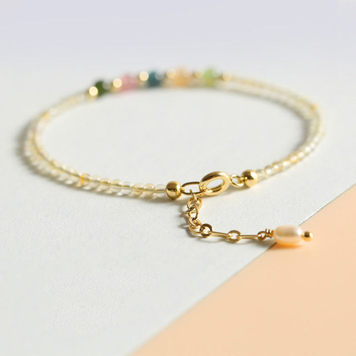 Braccialetto della prosperità con perle di rame riempite d'oro 14K e tormalina citrino ultrasottile da 2,5 mm Buddha Stones - image 1