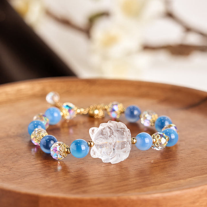 Braccialetto dell'armonia della volpe a nove code in cristallo bianco e agata blu caramella naturale Buddha Stones