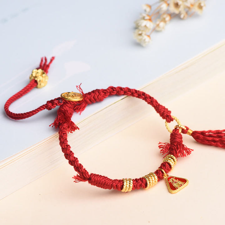 Braccialetto di protezione con nappa di fiori in corda tibetana con Buddha Stones , Zakiram, dea della ricchezza