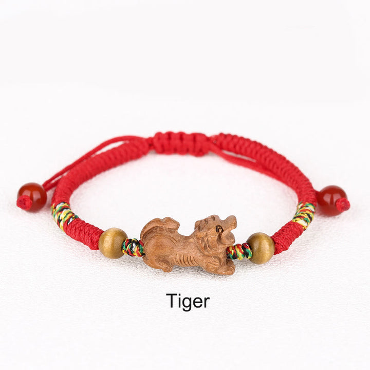 Braccialetto portafortuna in legno di pesca con corda rossa, fatto a mano, con zodiaco cinese di Buddha Stones