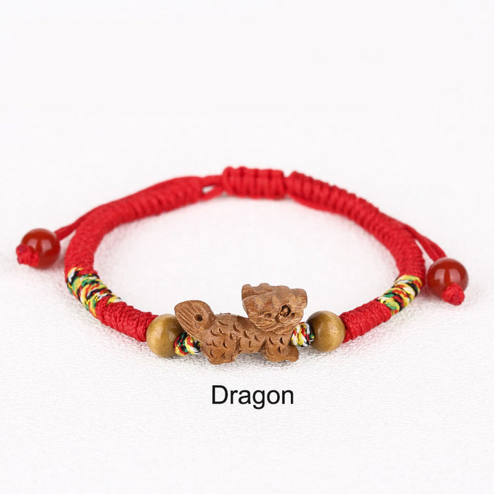 Braccialetto portafortuna in legno di pesca con corda rossa, fatto a mano, con zodiaco cinese di Buddha Stones