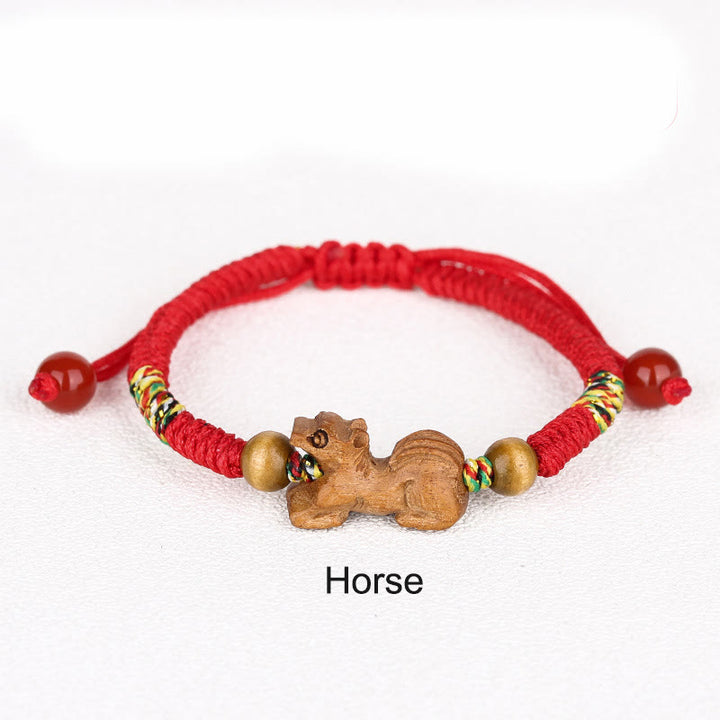 Braccialetto portafortuna in legno di pesca con corda rossa, fatto a mano, con zodiaco cinese di Buddha Stones
