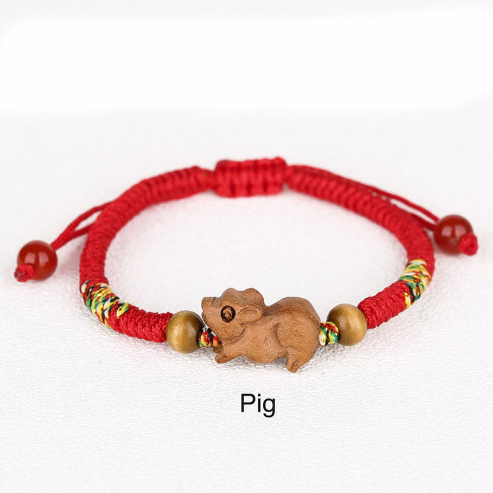 Braccialetto portafortuna in legno di pesca con corda rossa, fatto a mano, con zodiaco cinese di Buddha Stones