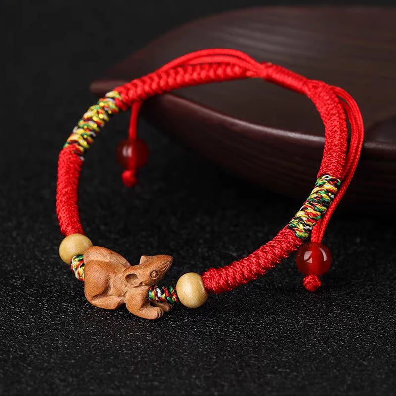 Braccialetto portafortuna in legno di pesca con corda rossa, fatto a mano, con zodiaco cinese di Buddha Stones