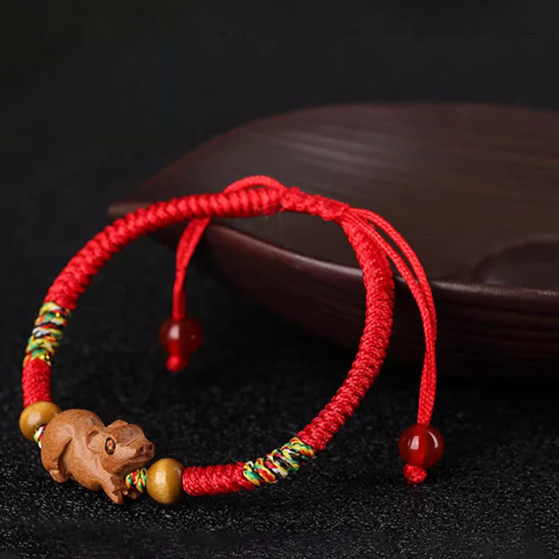 Braccialetto portafortuna in legno di pesca con corda rossa, fatto a mano, con zodiaco cinese di Buddha Stones