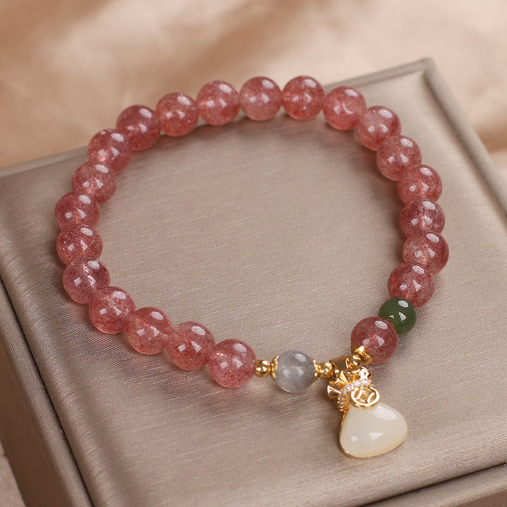 Braccialetto positivo con ciondolo a forma di sacco di soldi in quarzo fragola naturale Buddha Stones
