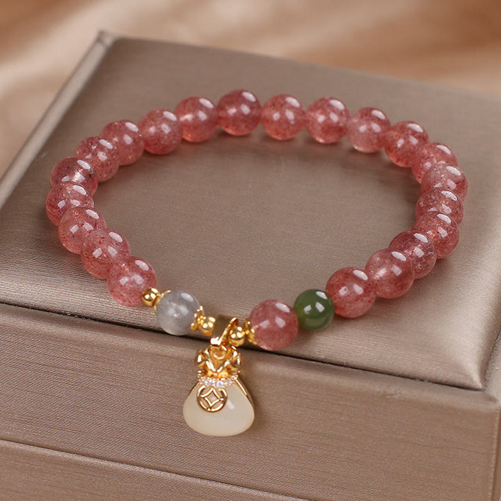 Braccialetto positivo con ciondolo a forma di sacco di soldi in quarzo fragola naturale Buddha Stones