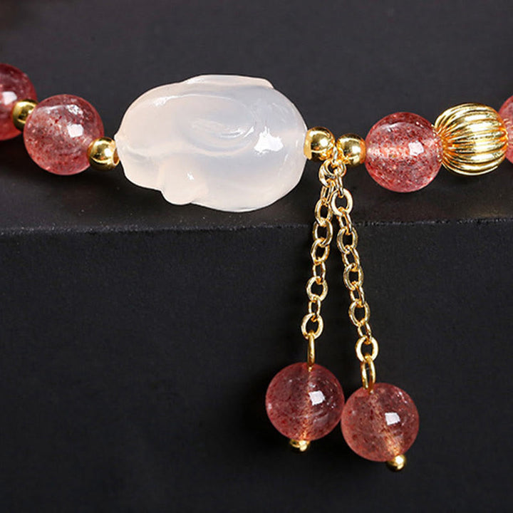 Braccialetto di guarigione naturale in quarzo fragola e agata con coniglio Buddha Stones