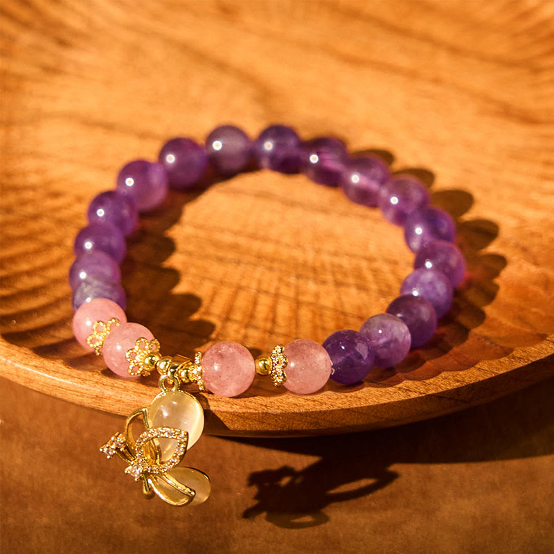 Braccialetto con ciondolo a farfalla in cristallo di quarzo fragola e ametista naturale Buddha Stones