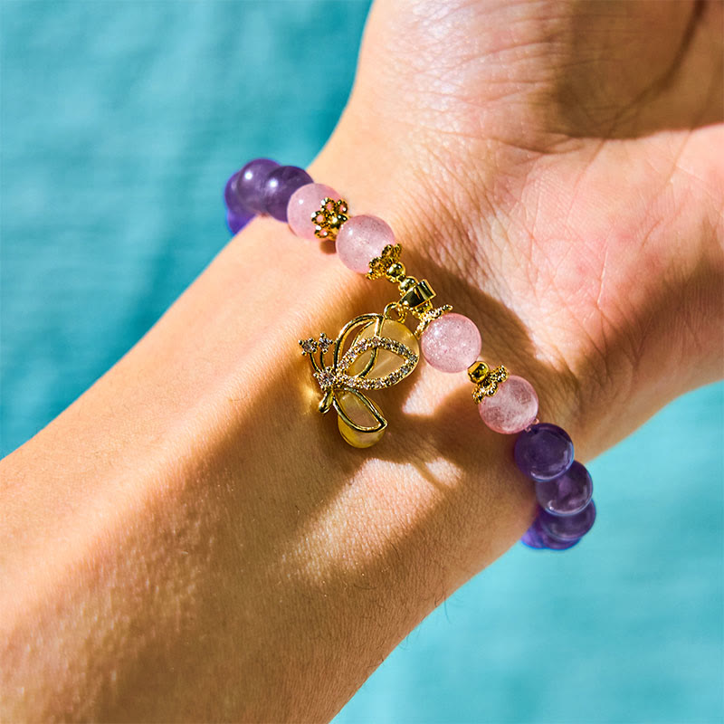 Braccialetto con ciondolo a farfalla in cristallo di quarzo fragola e ametista naturale Buddha Stones