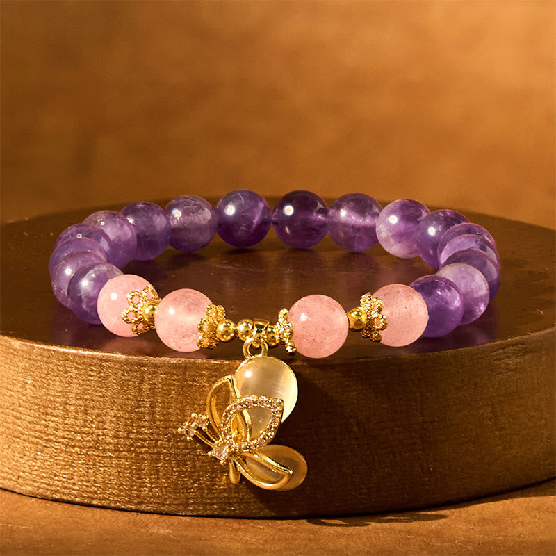 Braccialetto con ciondolo a farfalla in cristallo di quarzo fragola e ametista naturale Buddha Stones