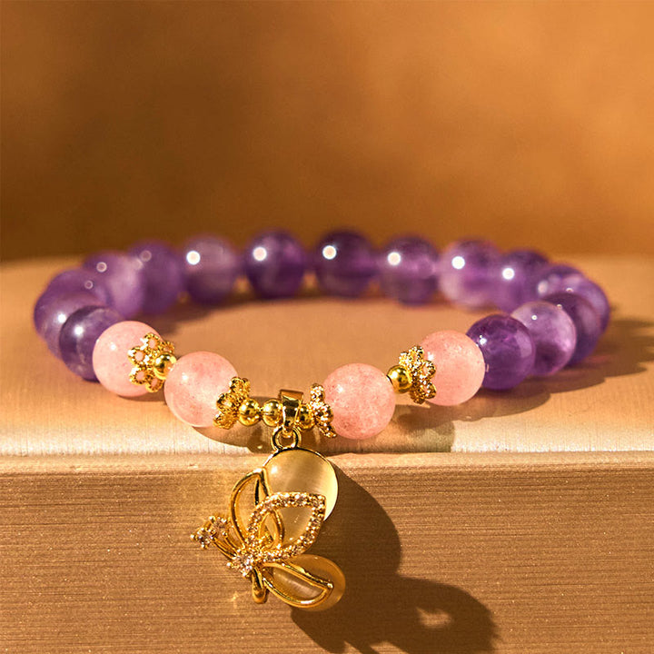 Braccialetto con ciondolo a farfalla in cristallo di quarzo fragola e ametista naturale Buddha Stones
