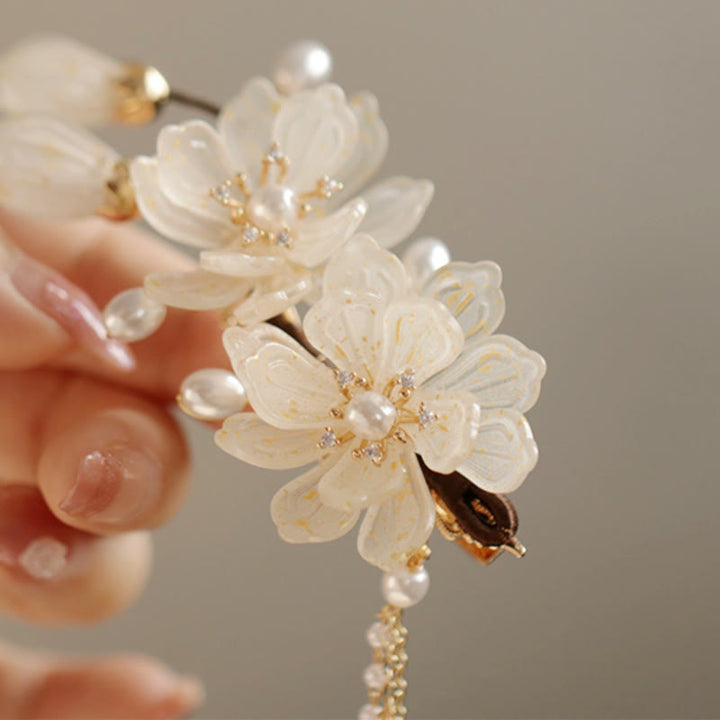 Fermaglio per capelli laterale con nappa di magnolia classica Buddha Stones