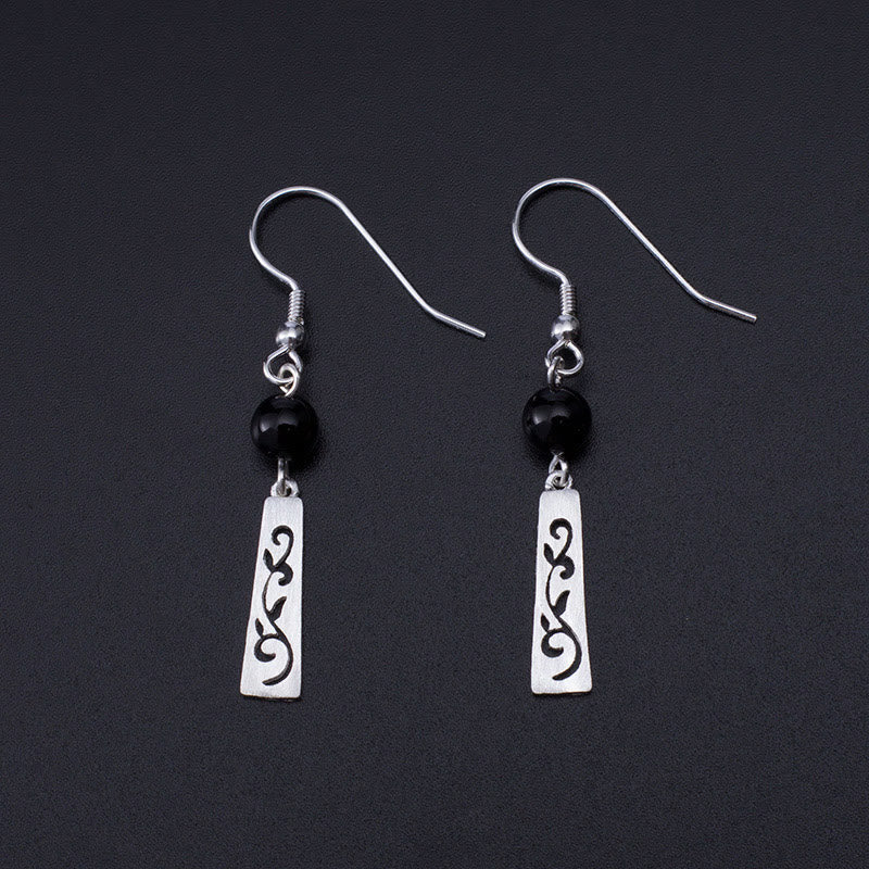 Orecchini pendenti con protezione a forma di vite cava in onice nero in argento sterling 925 Buddha Stones - Argento Sterling 925 - image 0
