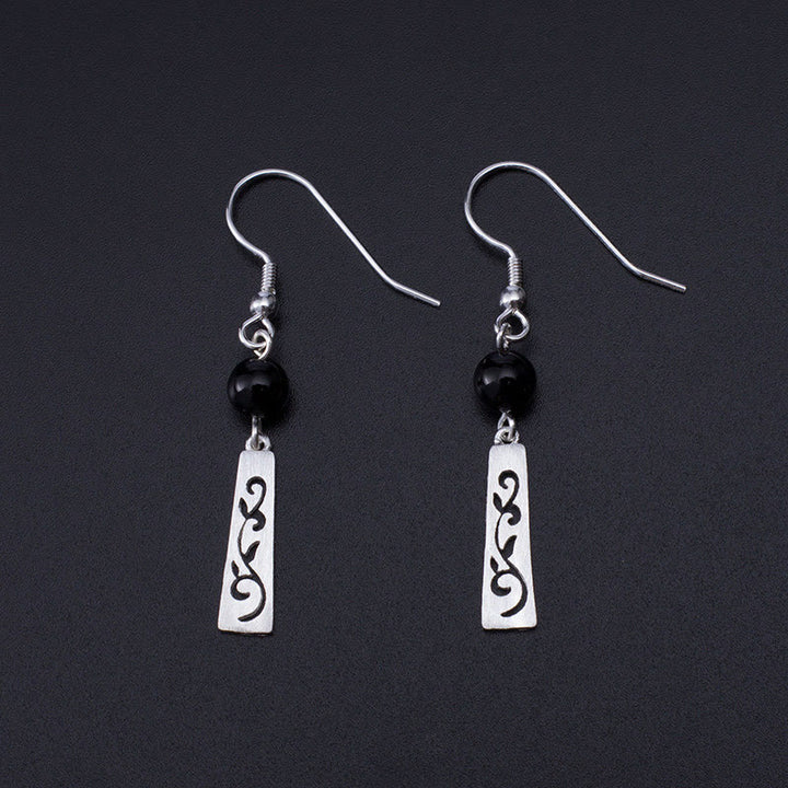 Orecchini pendenti con protezione a forma di vite cava in onice nero in argento sterling 925 Buddha Stones - Argento Sterling 925 - image 0