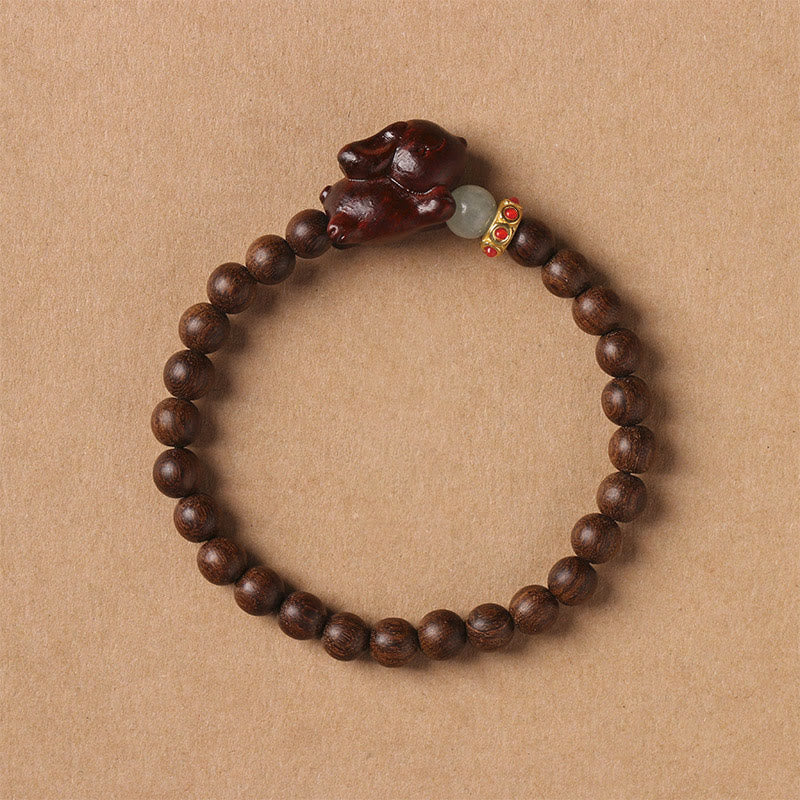 Braccialetto positivo con coniglio carino in legno di sandalo verde e oro Buddha Stones