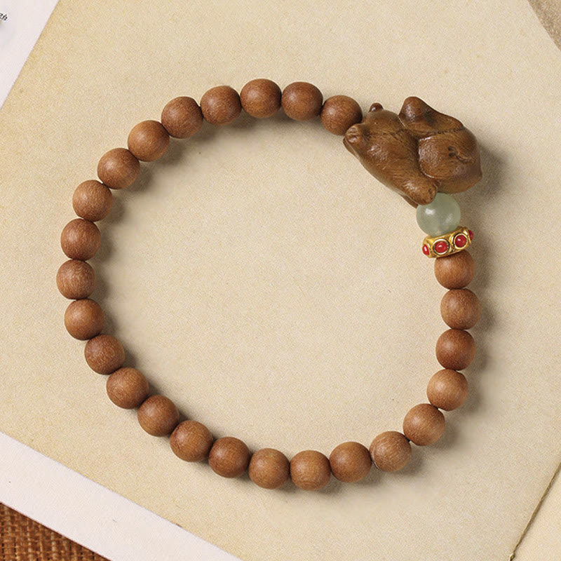Braccialetto positivo con coniglio carino in legno di sandalo verde e oro Buddha Stones