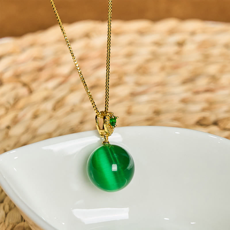 Buddha Stones Collana con ciondolo a forma di palla rotonda con occhio di gatto e simbolo di fiducia - image 15
