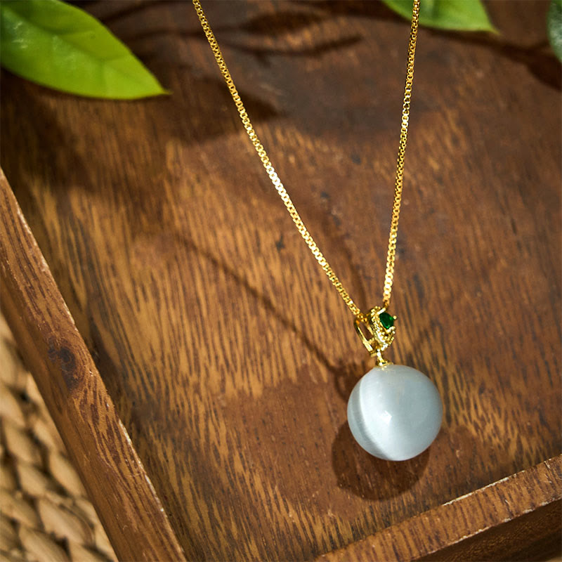 Buddha Stones Collana con ciondolo a forma di palla rotonda con occhio di gatto e simbolo di fiducia - image 21