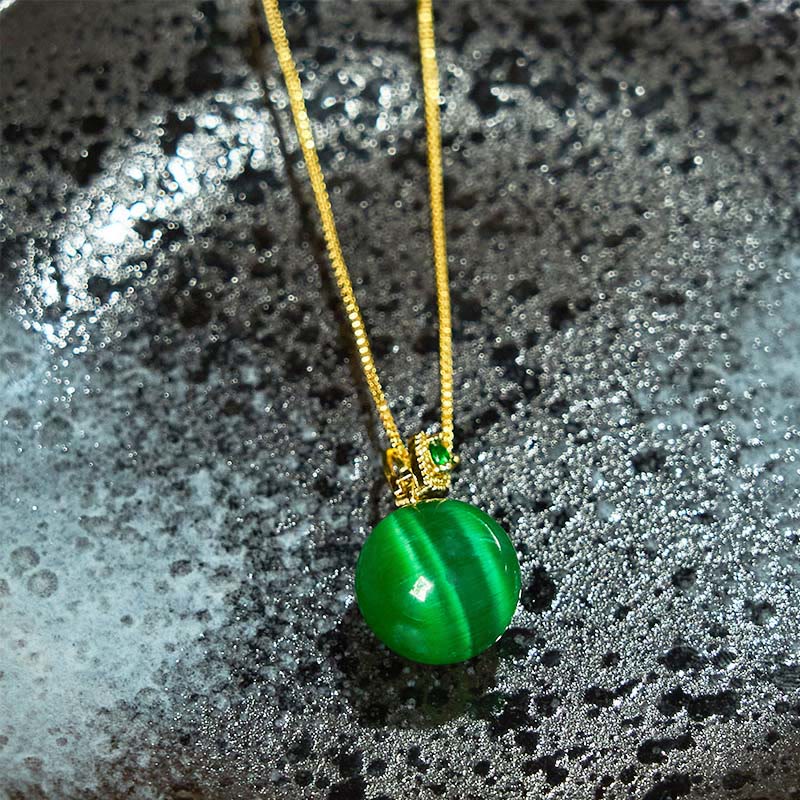 Buddha Stones Collana con ciondolo a forma di palla rotonda con occhio di gatto e simbolo di fiducia - image 16