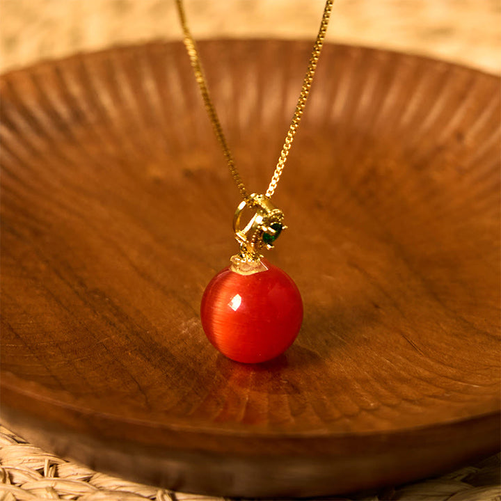 Buddha Stones Collana con ciondolo a forma di palla rotonda con occhio di gatto e simbolo di fiducia - Occhio di gatto rosso - image 6
