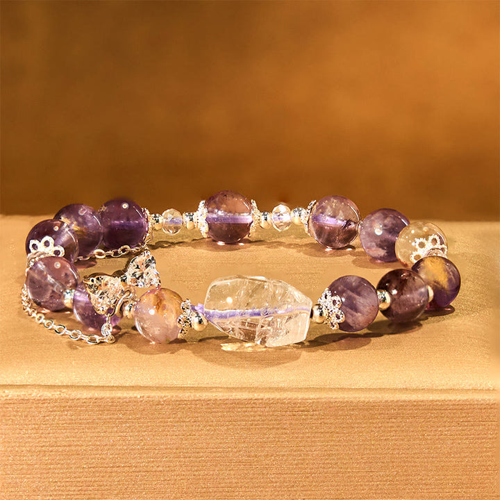 Braccialetto della saggezza con arco fantasma viola naturale Buddha Stones