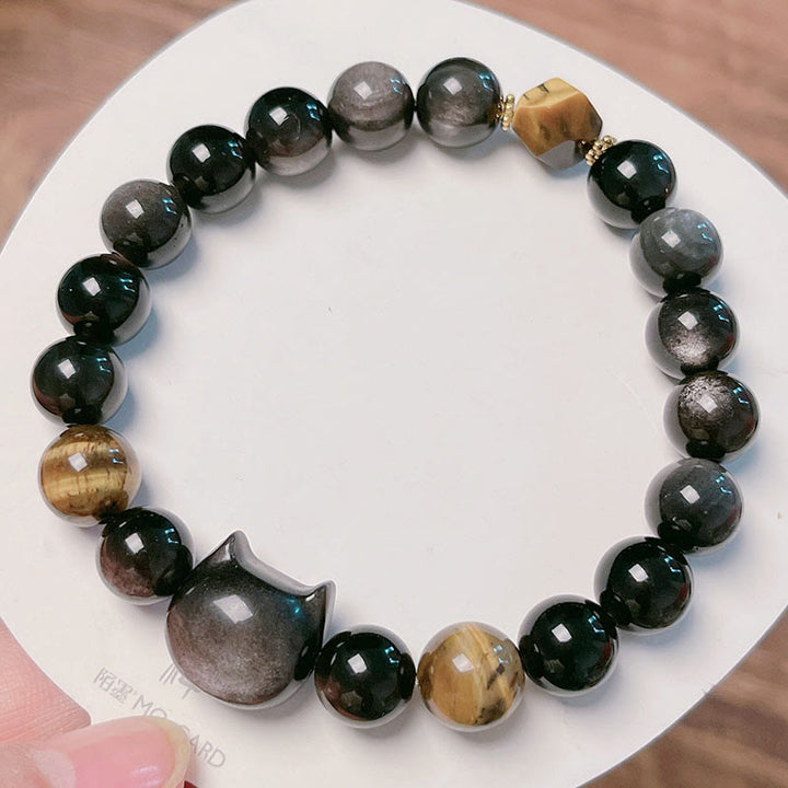 Braccialetto rilassante con perline di ossidiana lucida in argento naturale Buddha Stones - image 11