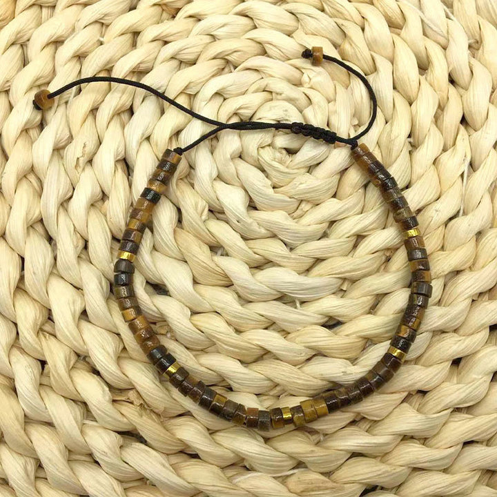 Braccialetto di perline distanziatrici in occhio di tigre naturale Buddha Stones