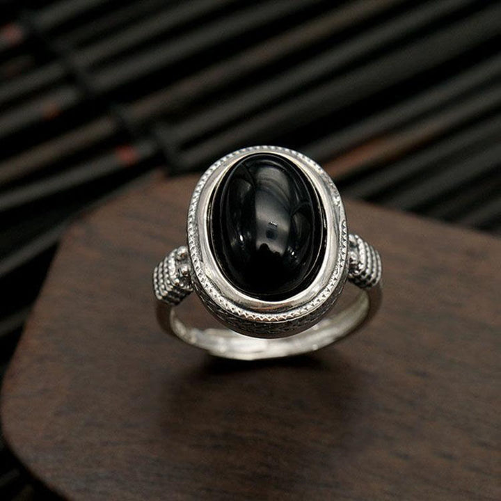 Anello di protezione regolabile in onice nero naturale Buddha Stones