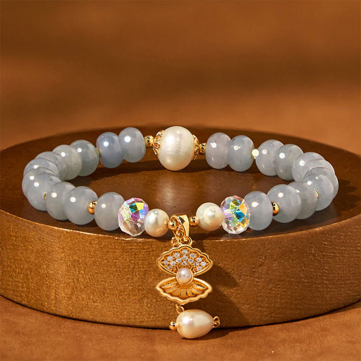 Braccialetto di perle curative in conchiglia di perle di acquamarina naturale Buddha Stones