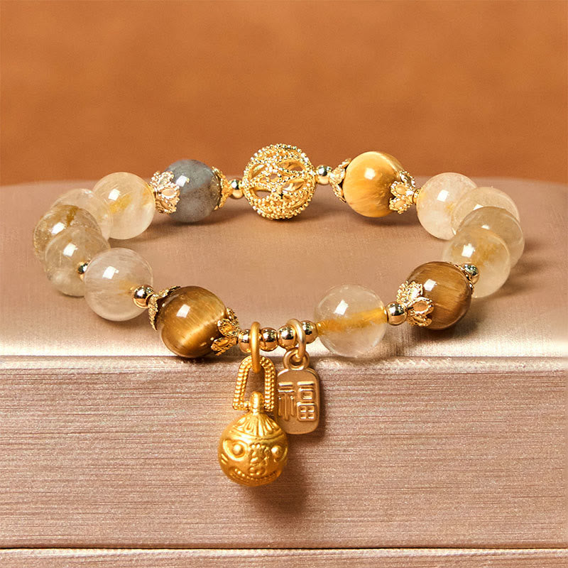 Braccialetto di auspicio Buddha Stones in quarzo rutilato naturale Fu Character Metal che ingoia la bestia