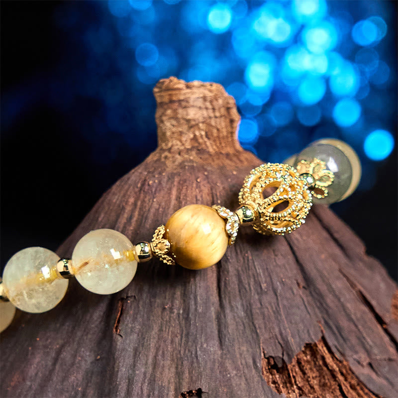 Braccialetto di auspicio Buddha Stones in quarzo rutilato naturale Fu Character Metal che ingoia la bestia