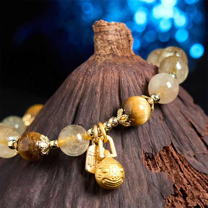 Braccialetto di auspicio Buddha Stones in quarzo rutilato naturale Fu Character Metal che ingoia la bestia